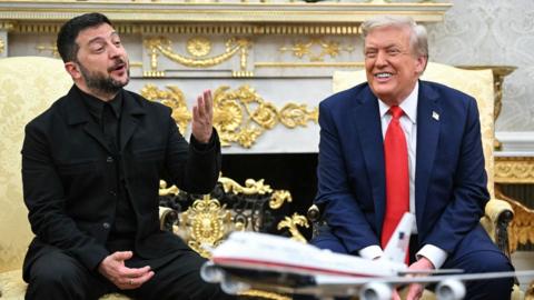 Zelensky and Trump sitting in the White House.