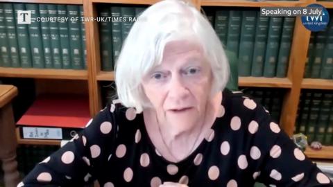 Anne Widdecombe wearing a dark top with white spots.