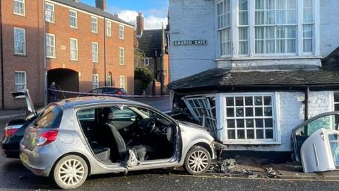 A car wreckage after crashing into the Ye Olde White Horse pub in Spalding