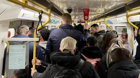 Passengers on a rush-hour Metro on Tuesday 14 March