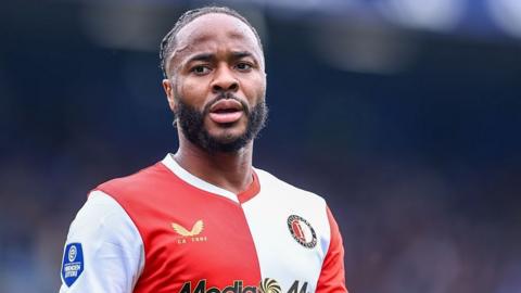 Raheem Sterling in a Feyenoord club shirt