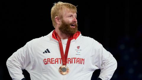 Chris Skelley with his Paralympic bronze medal in Paris