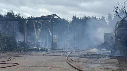Buildings at Parallax Equestrian and Plastics, in Gunthorpe, Nottinghamshire, damaged by fire.