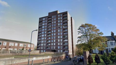 Image of a redbrick tower block where some of Ms Jones' tenants live