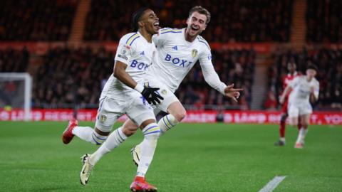 Crysencio Summerville and Patrick Bamford celebrate during Leeds' win at Middlesbrough