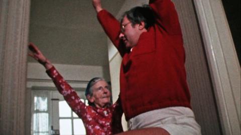 Hilda Cawood teaches Nationwide presenter Bernard Falk how to exercise at home.