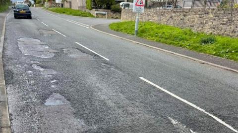 Potholes on a road in St Austell