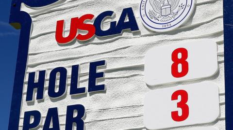 A board at Oakmont Country Club showing hole eight and par three