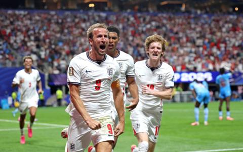 Harry Kane and other England players celebrate his winning goal against DR Congo in the stadium in Atlanta.