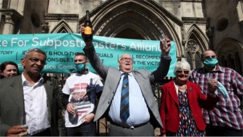 Former sub-postmasters celebrate outside the Court of Appeal