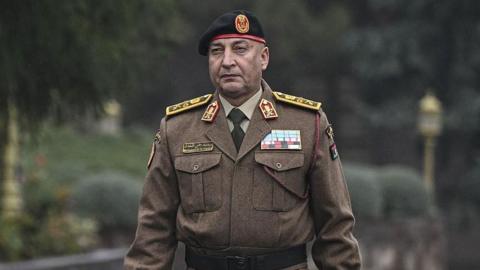 LIbya's army chief Gen Mohammed Ali Ahmed al-Haddad is seen walking during his visit to Ankara, Turkey while wearing a brown army uniform. Photo: 23 December 2025