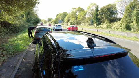 Traffic officers check vehicles to try to stop drug dealing