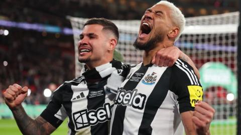 Bruno Guimaraes and Joelinton celebrate winning the Carabao Cup