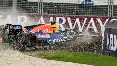 A close-up view of George Russell driving the Mercedes with a grandstand in the background during final practice for the Australian Grand Prix