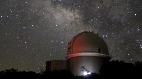 Super telescope against a starry sky