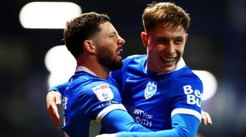 Conor Chaplin celebrates with Portsmouth team-mate Mark Kosznovszky