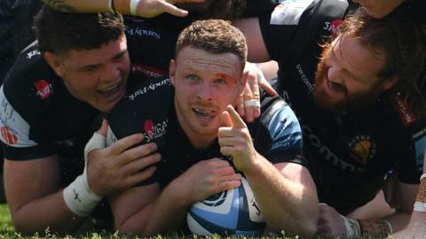 Sam Simmonds celebrates his 20th Premiership try of season