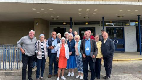 Campaigners celebrating outside of Durham County Hall when the plans for the football centre were rejected