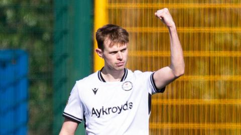 Cameron Ferguson celebrates a goal for Bala