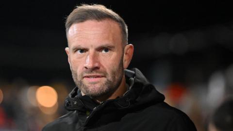 Ian Evatt looks on during the tail end of his spell with Bolton Wanderers