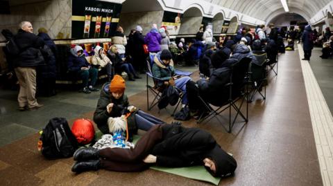 People sheltering in Kyiv metro station