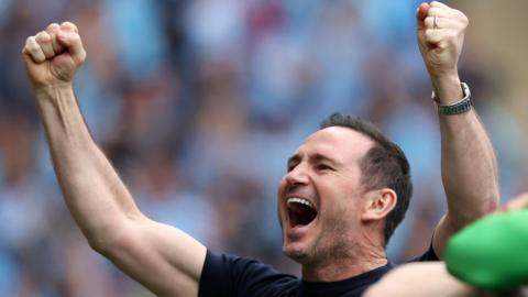 Frank Lampard with fists clenched and both arms in the air