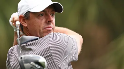 Rory McIlroy hits a shot in the final round of The Players at Sawgrass