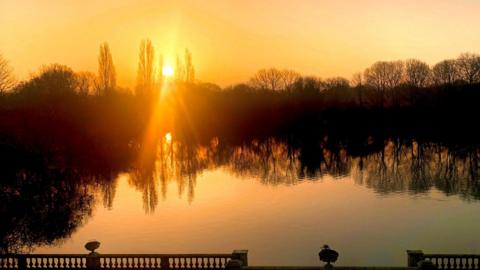 Fiery sunrise over the River Thames in Twickenham, Greater London