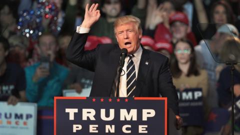 Republican presidential nominee Donald Trump addresses supporters during a campaign rally on November 8, 2016 in Grand Rapids, Michigan