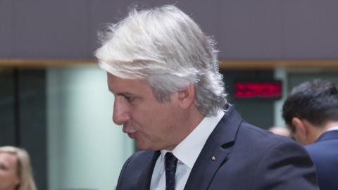 Romanian Minister of Public Finance Eugen Teodorovici (R) prior to a round table meeting of Eurogroup finance ministers at the Europa building, the European Council headquarters, on November 5, 2018 in Brussels, Belgium