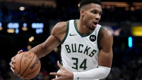 Giannis Antetokounmpo of the Milwaukee Bucks holds the ball in his right hand during their NBA match against the Indiana Pacers