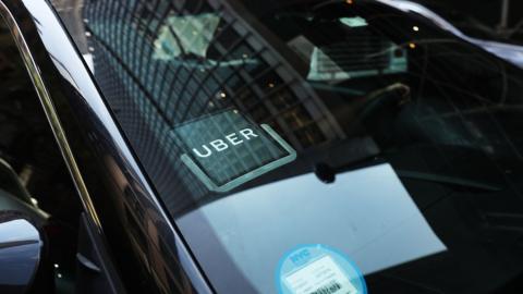 An Uber car waits for a client in Manhattan