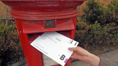 A ballot being posted