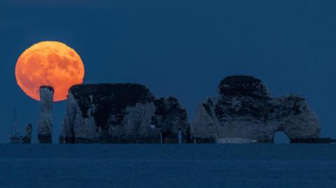 Strawberry Moon rising - taken from Swanage, Dorset