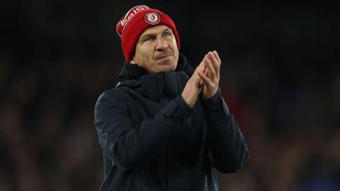 Bristol City coach Gerhard Struber applauds the away fans after his team's defeat at Ipswich Town