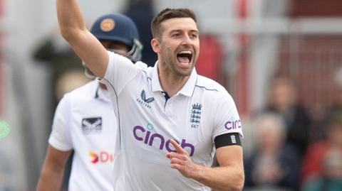 Mark Wood celebrates