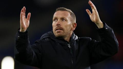 Craig Bellamy applauds the Cardiff City Stadium crowd