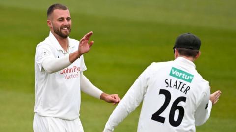 Nottinghamshire fast bowler Fergus O'Neill celebrates taking a wicket against Hampshire in the Rothesay County Championship