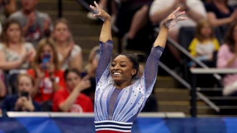 Simone Biles poses during floor routine