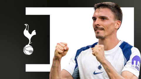 Palhinha celebrates for Tottenham. He wears the home shirt.