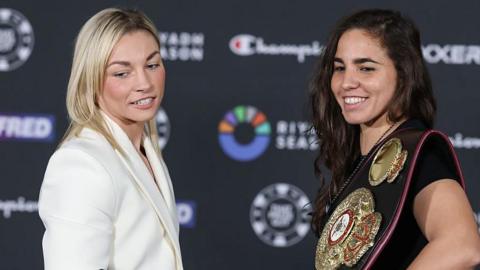 Lauren Price and Stephanie Pineiro smile at media day