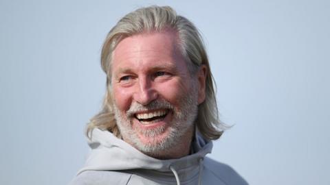 Robbie Savage smiles