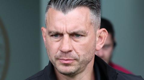 A stern looking Luton boss Matt Bloomfield