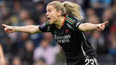 Arsenal's Alessia Russo celebrating her opening goal against Tottenham