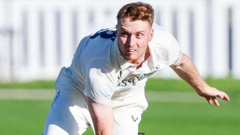 Joey Evison in action bowling for Kent