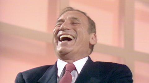 Film director Mel Brooks laughs uproariously during a Terry Wogan interview in 1984.