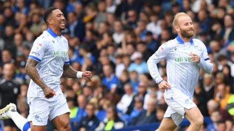 Barry Bannan celebrates scoring for Sheffield Wednesday at Portsmouth