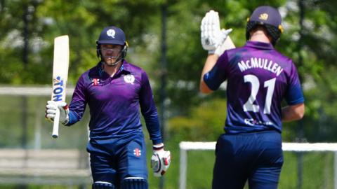 Richie Berrington is applauded by Brandon McMullen during Scotland's win over the Netherlands in the final match of the series