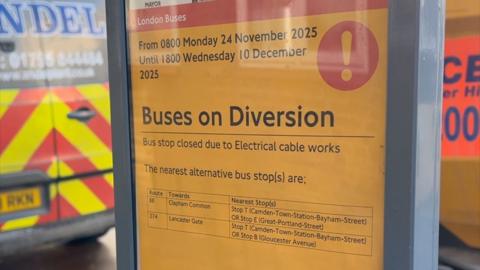 Sign notifying of bus diversions due to electrical work.