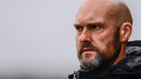 Notts County boss Luke Williams looks on as his team is in action